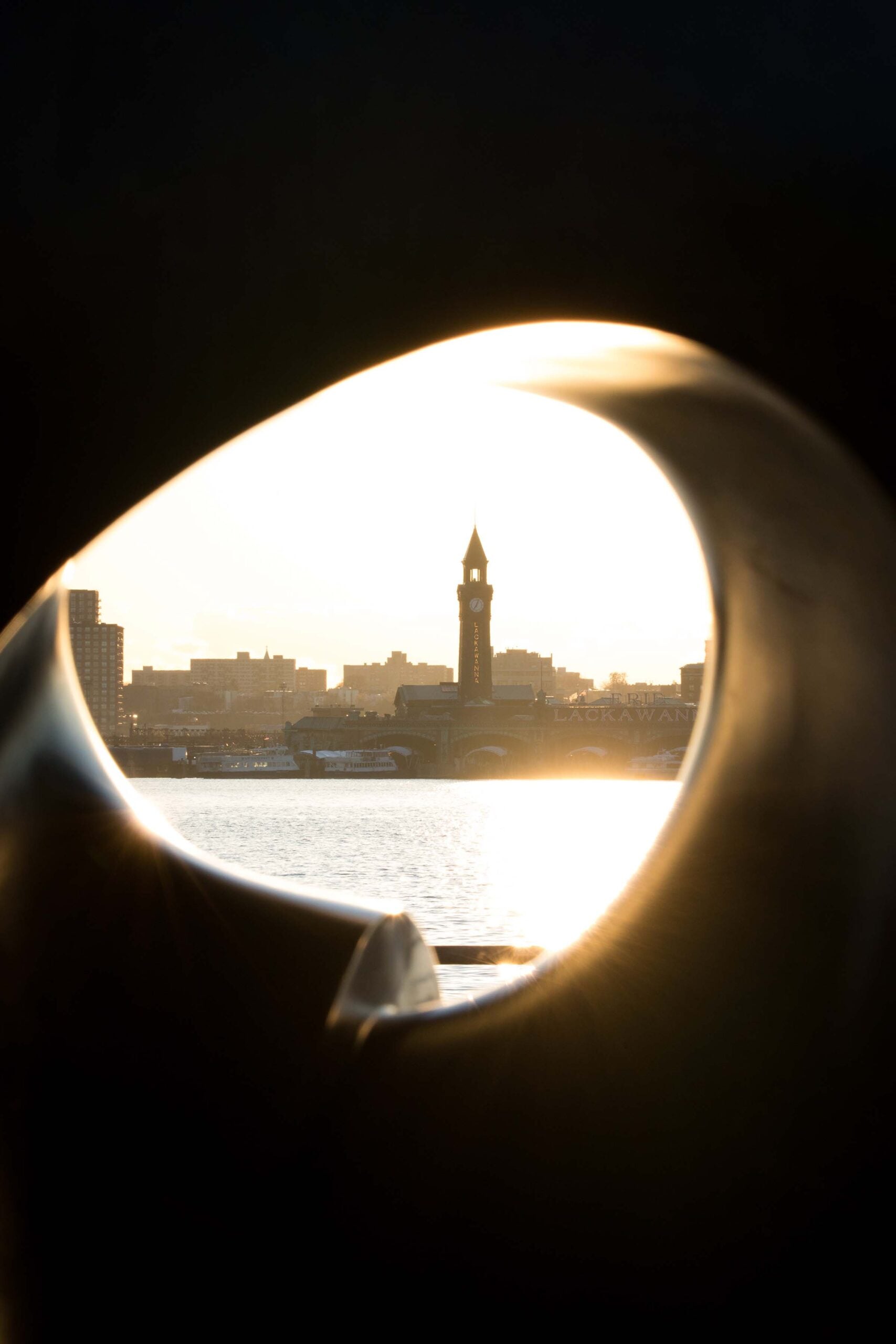 Through the Apple's core you can see the tower across the Hudson River in New Jersey