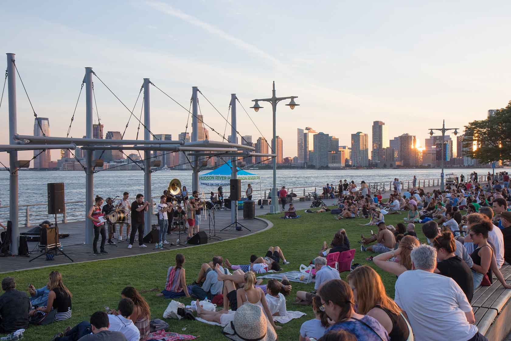 A brass band plays for a crowd at Pier 45