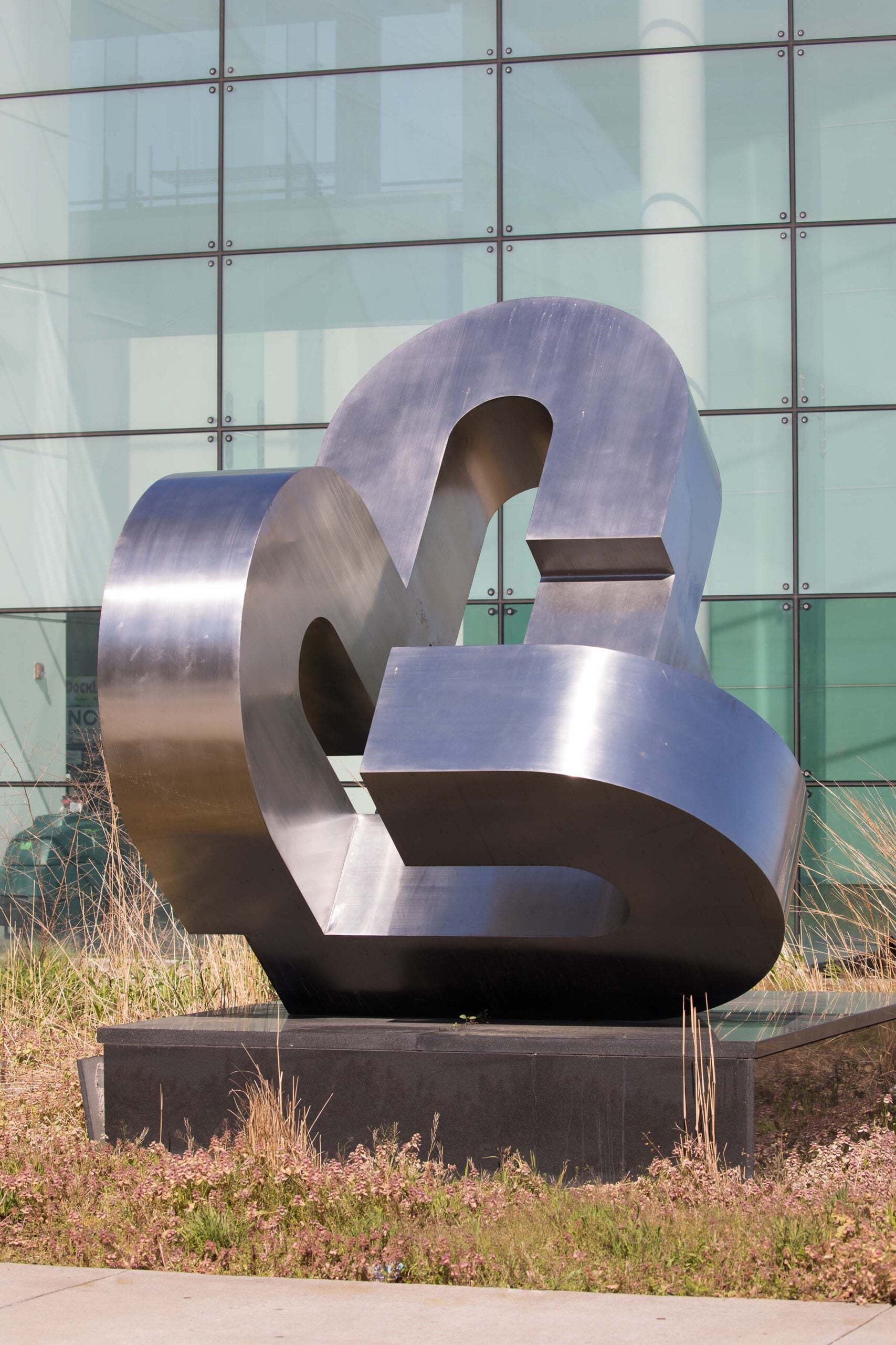 The art piece SENES sits on Pier 79, a steel structure with round edges connected to each other