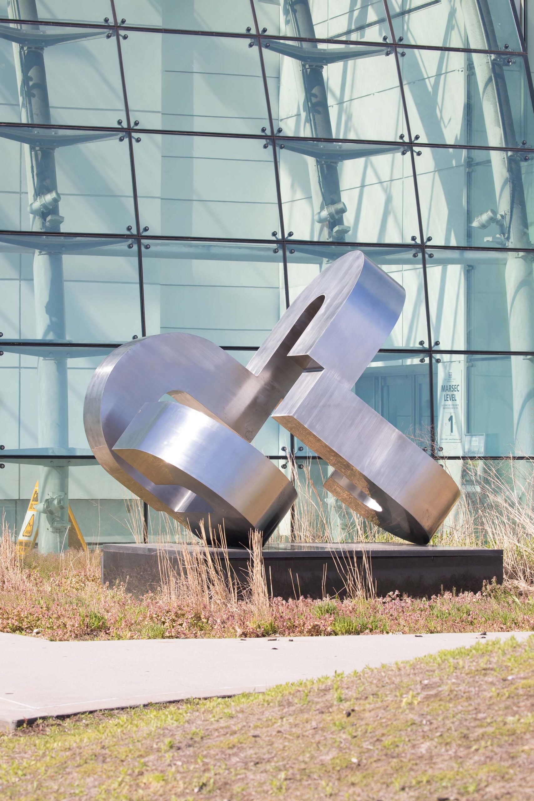 The art piece SENES sits on Pier 79, a steel structure with round edges connected to each other