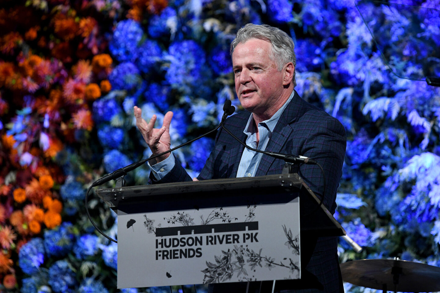 A speaker introduces Michael Bloomberg at the Gala