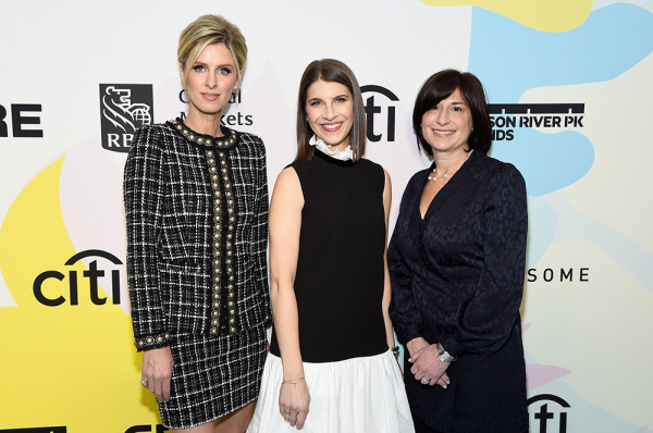 Three women pose for a picture
