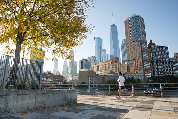 Another jogger runs in the morning around Pier 25