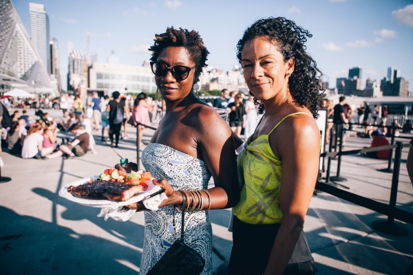 Park visitors enjoy the ribs at Blues BBQ in Hudson River Park