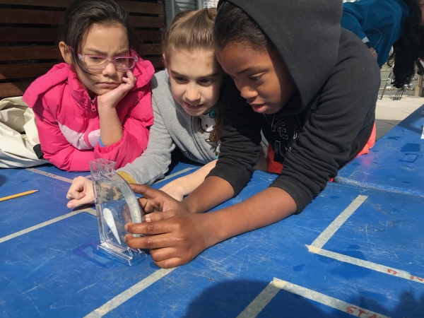 Educators teach the students about the PH balance in the Hudson River