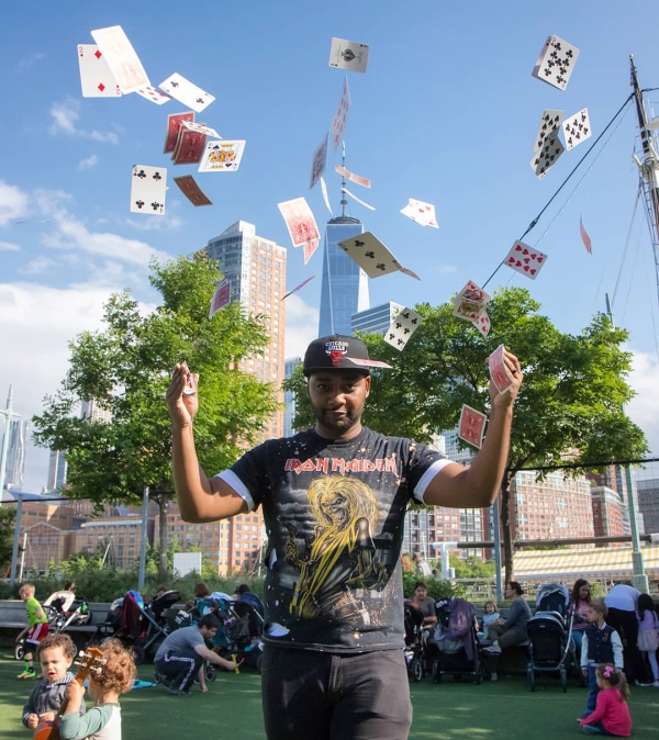 Kid Ace performs magic for the kids at Pumpkin Smash