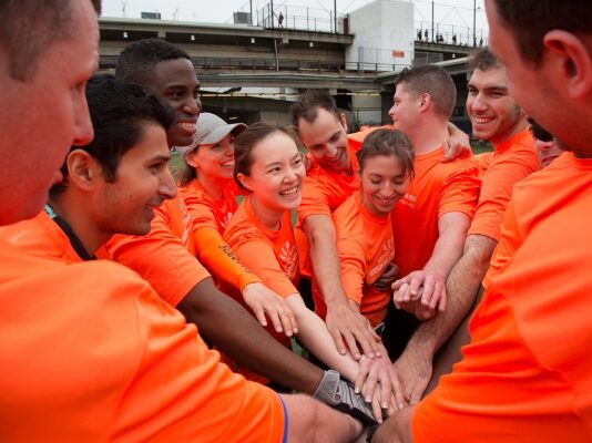 The orange team at the HRPK Games wish each other good luck