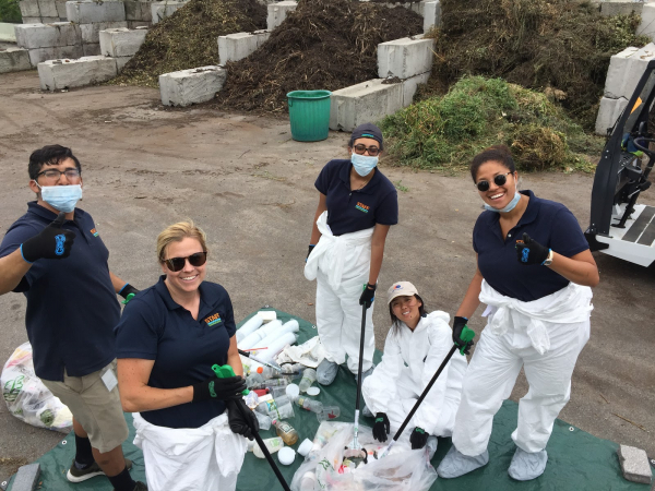 Park members of the Estuary Lab work to clear out plastics found in the Hudson River