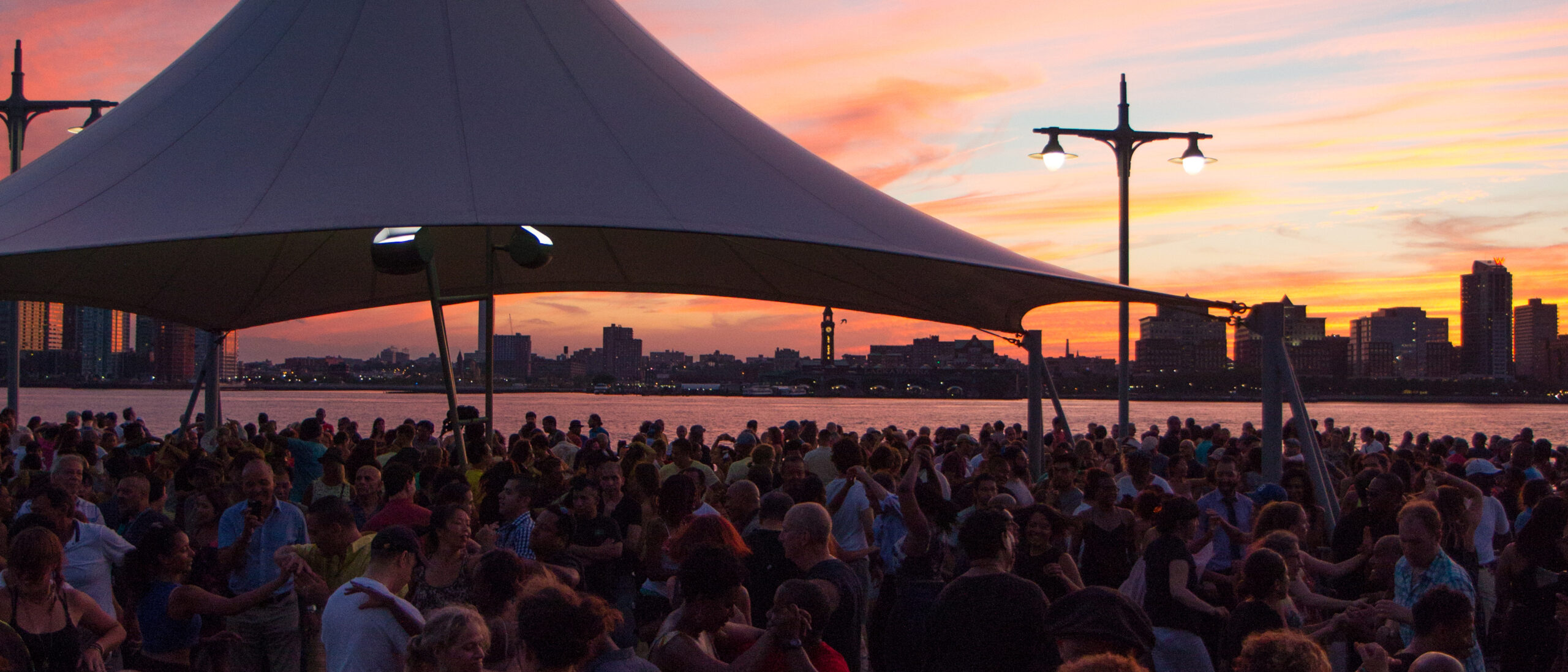 The sunset over Pier 45 during Salsa with Talia in Hudson River Park