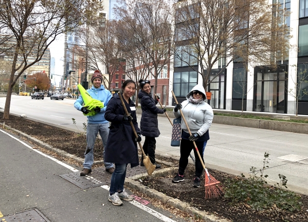 Volunteers help Hudson River Park's Horticulture staff clean out the ares where new trees will be planted