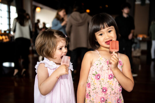 Kids enjoy Popsicles at the bbq