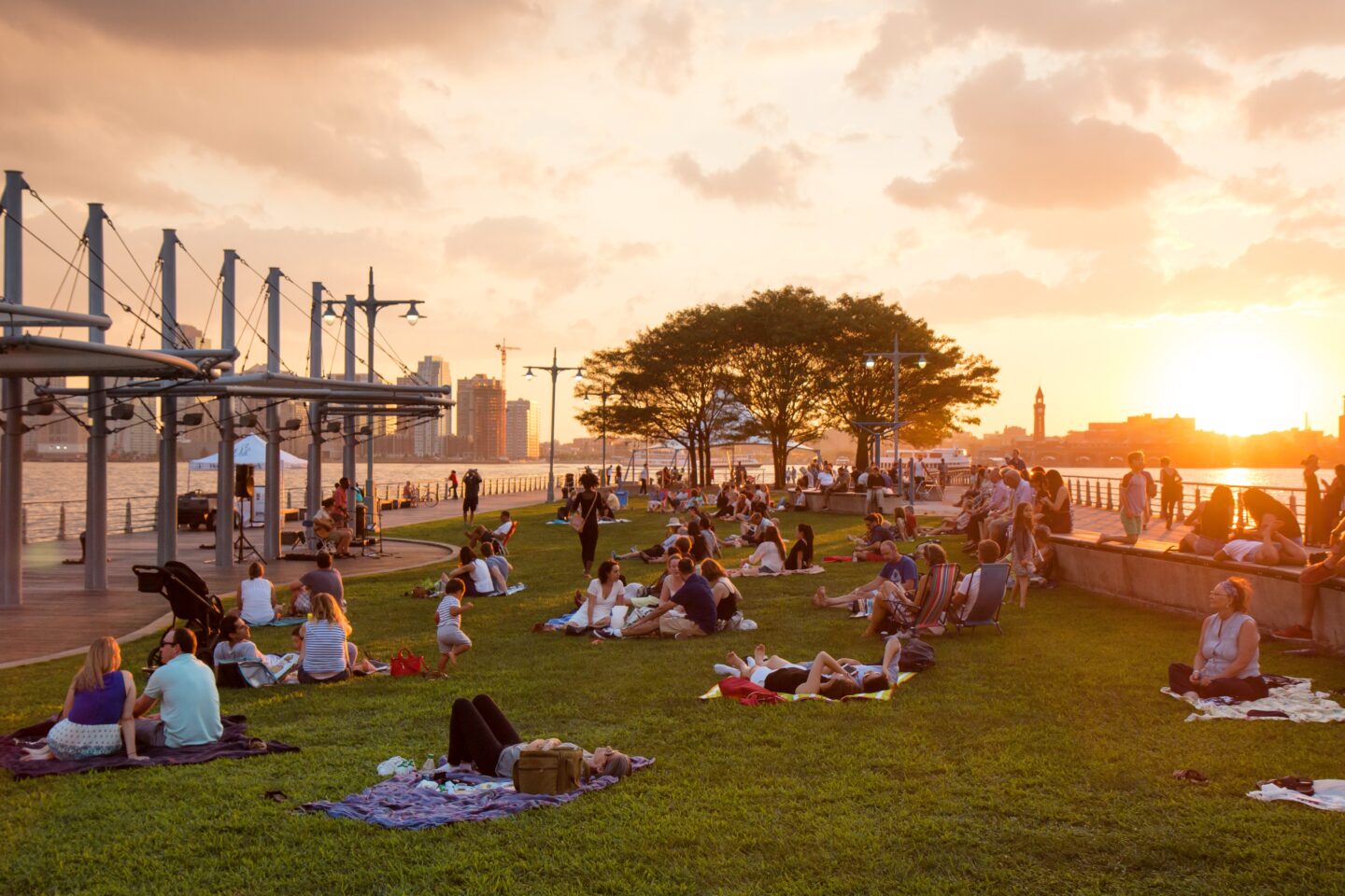 People enjoying a sunset from Pier 45