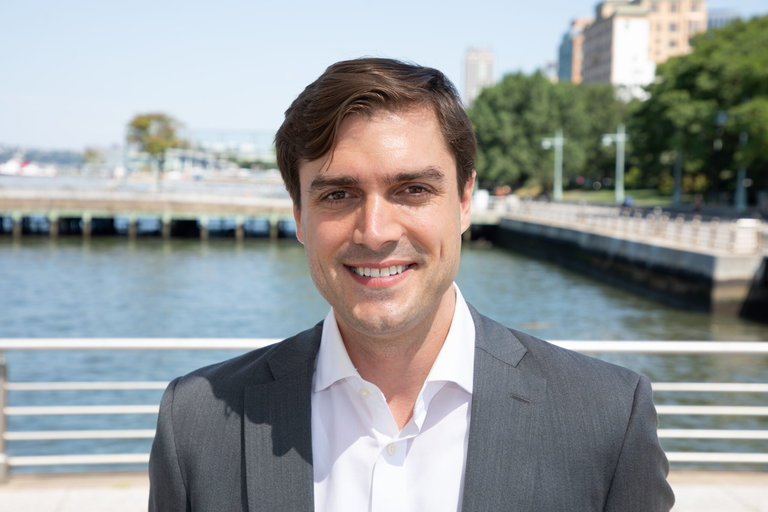 Professional headshot of Robert Atterbury on a Hudson River Park pier