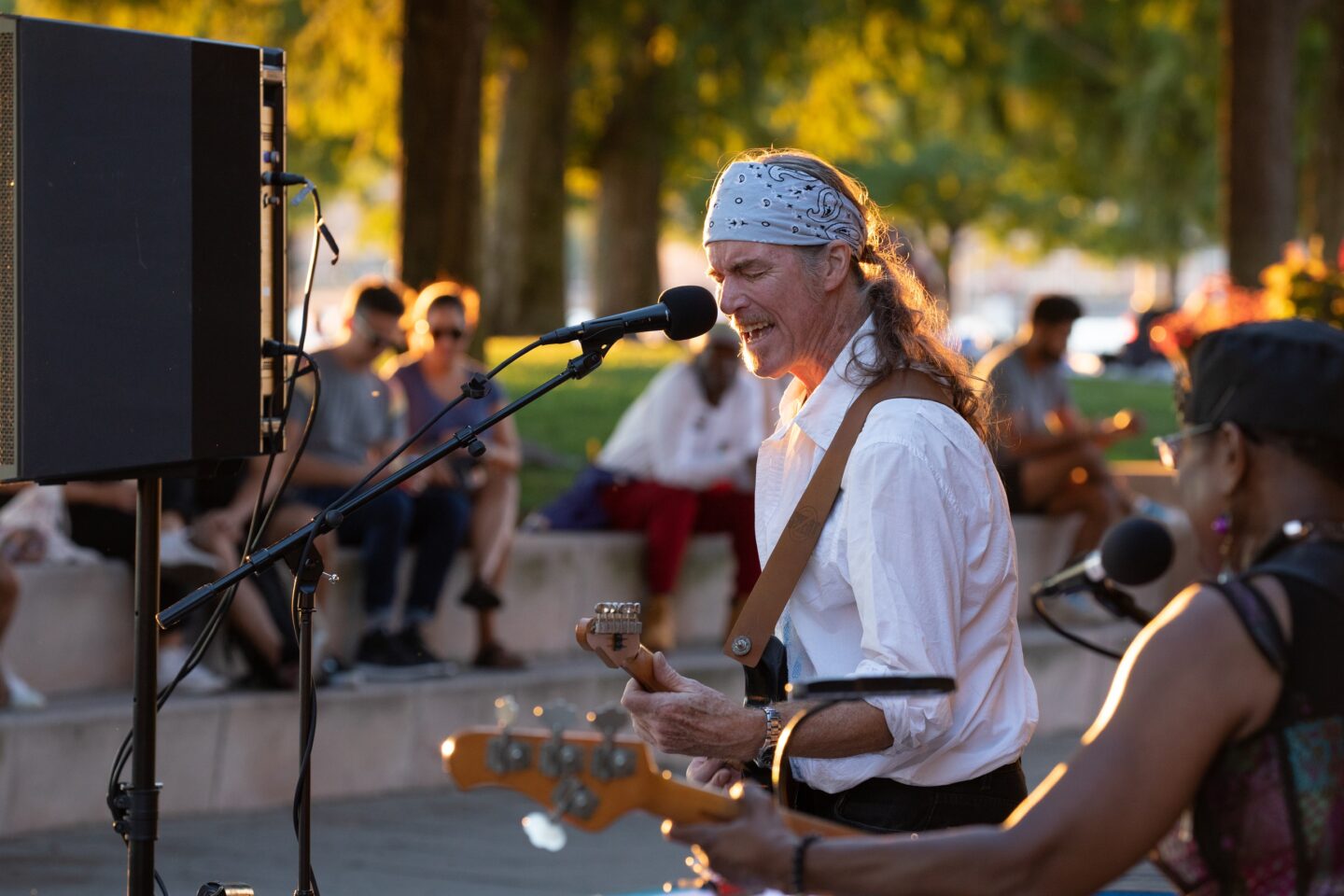 Jazz at Pier 84, performer with guitar at sunset
