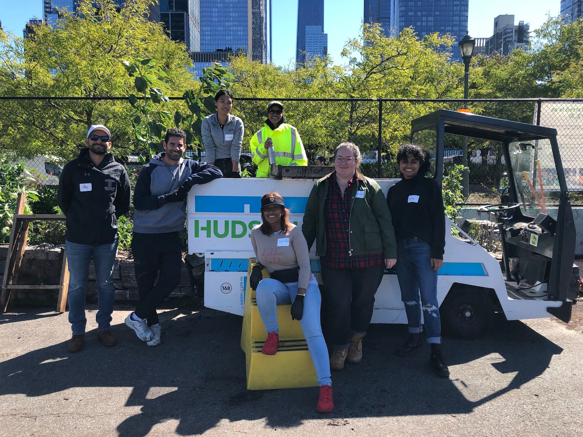 Volunteers pose with motrec at Compost Center in Hudson River Park