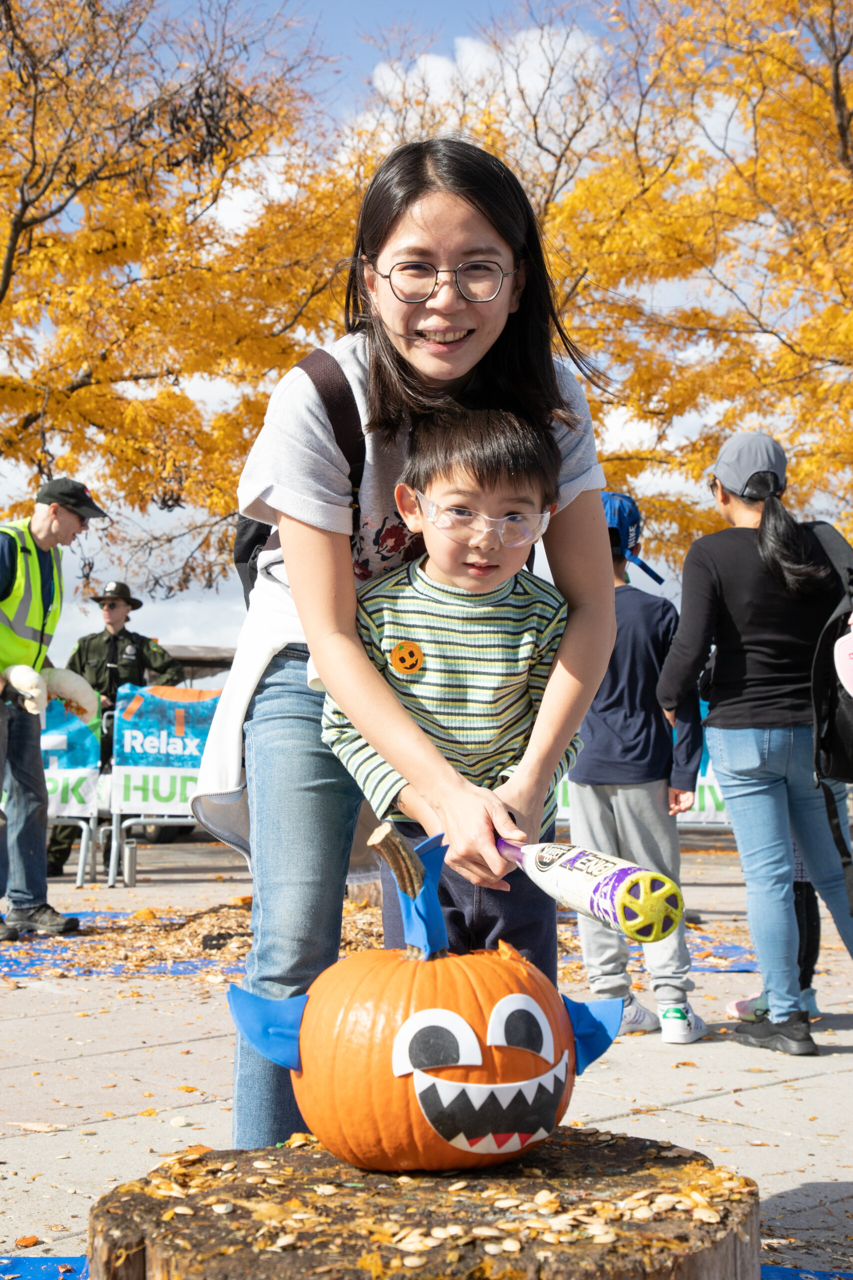 Pumpkin Smash, mother and sun smash pumpkin with silly face