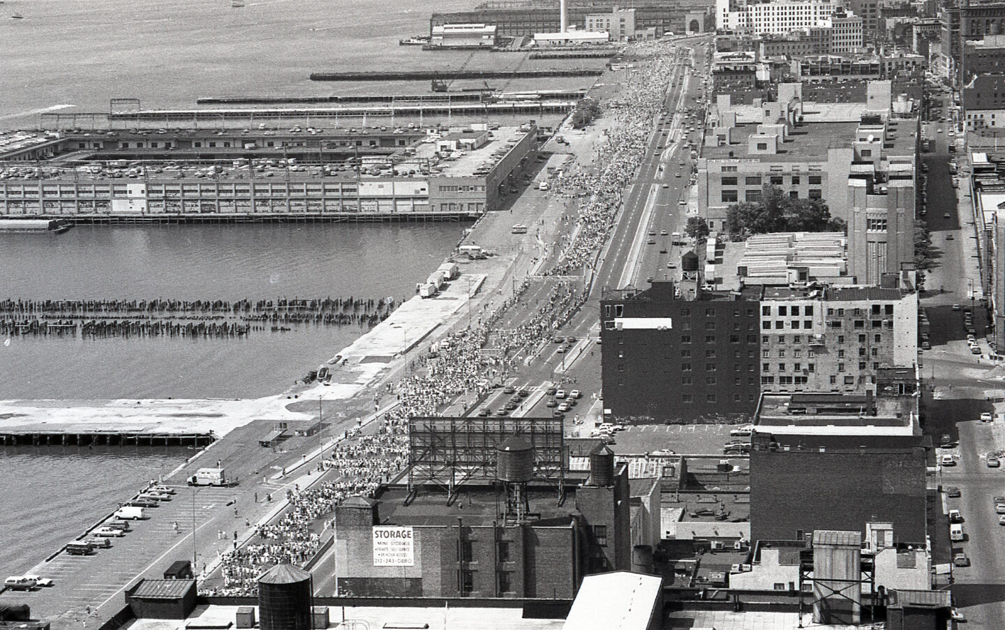 People gathered together on the West Side Highway for Hands Across America.