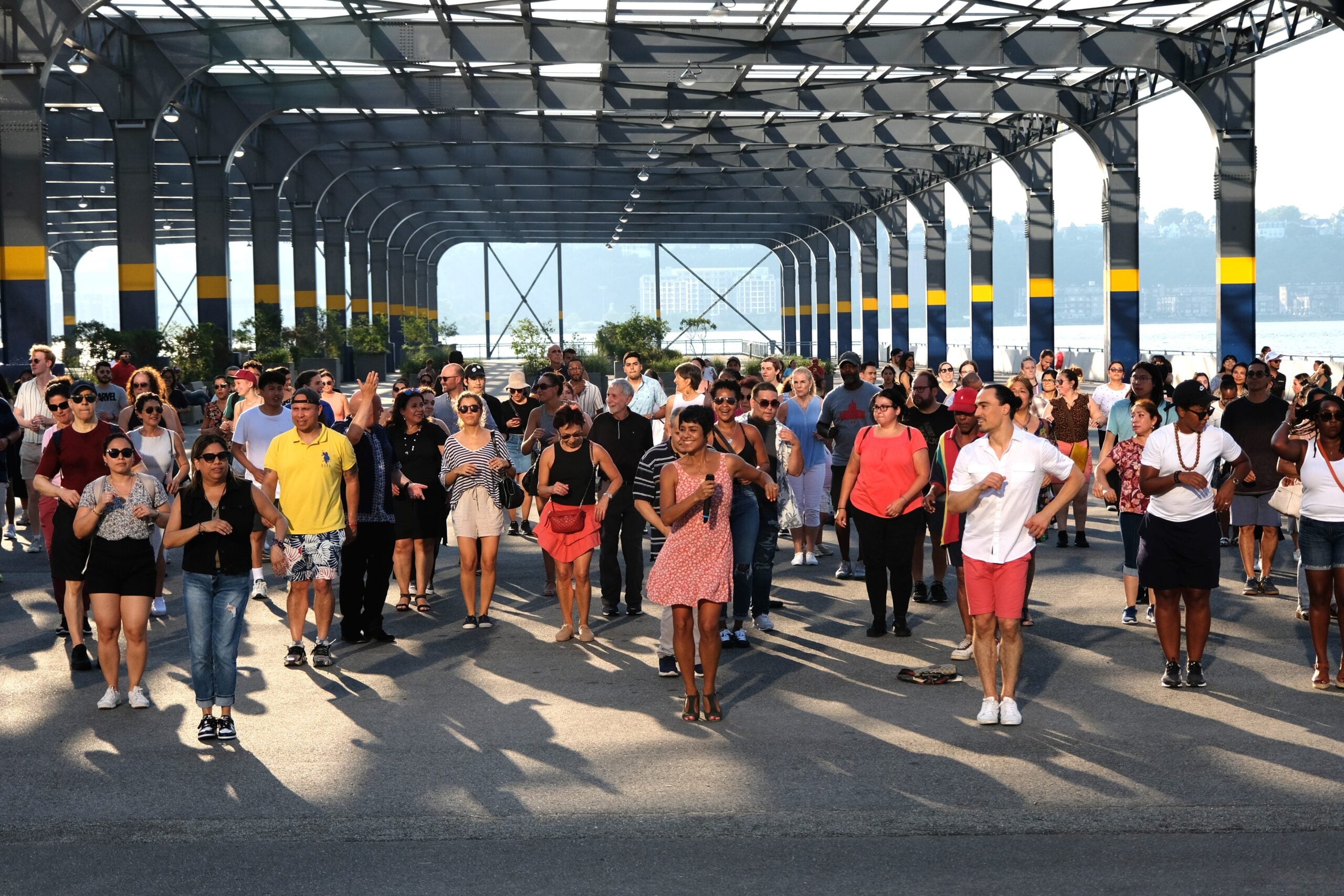 People dancing at a Sunset Salsa class on Pier 76.