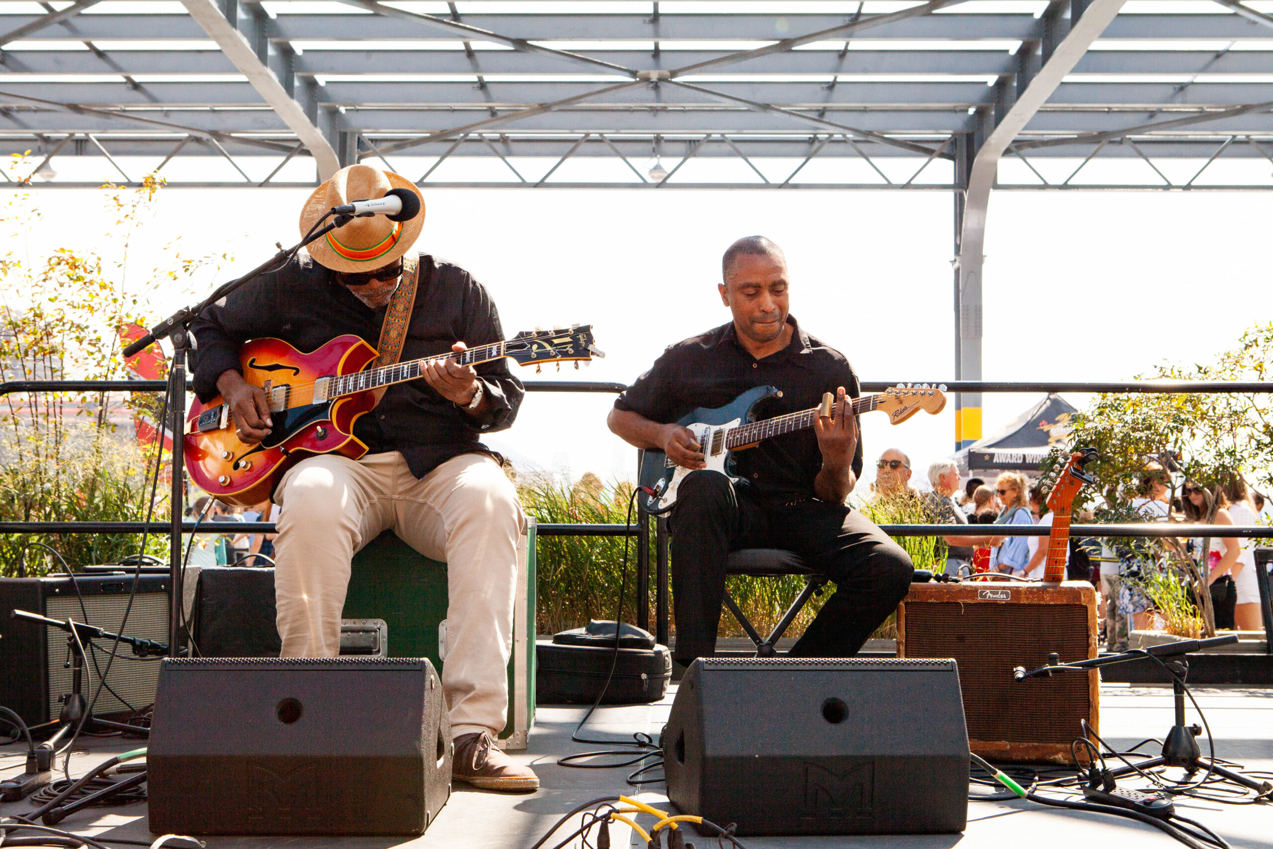 Ed Cherry and Marvin Sewell playing guitar on the Blues BBQ Festival Second Stage