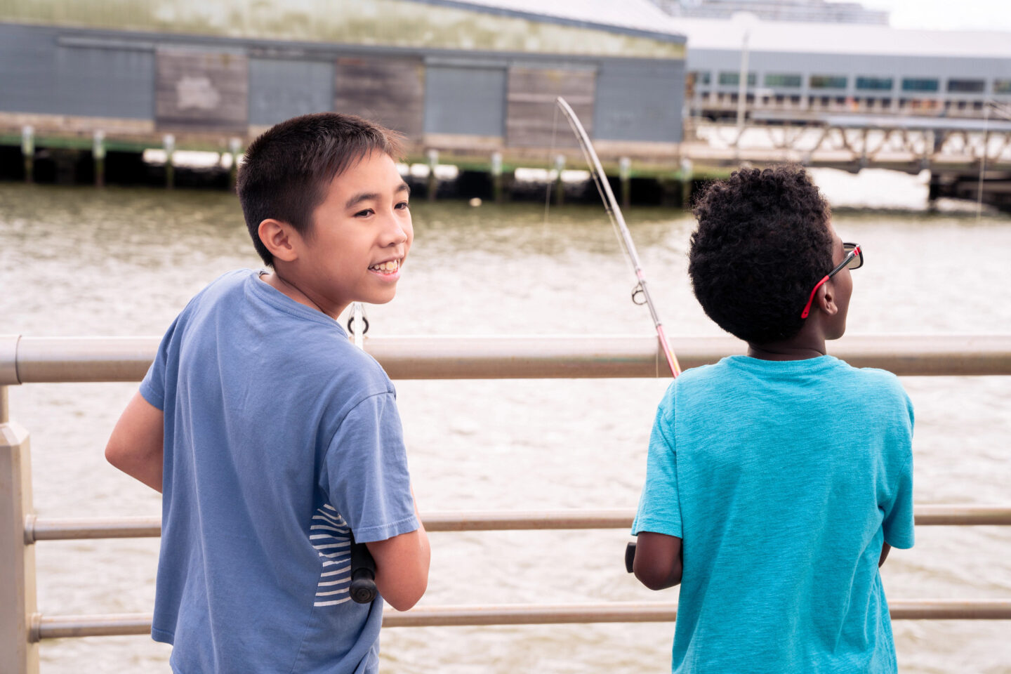 2 children fishing